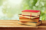 Old vintage books over beautiful bokeh background